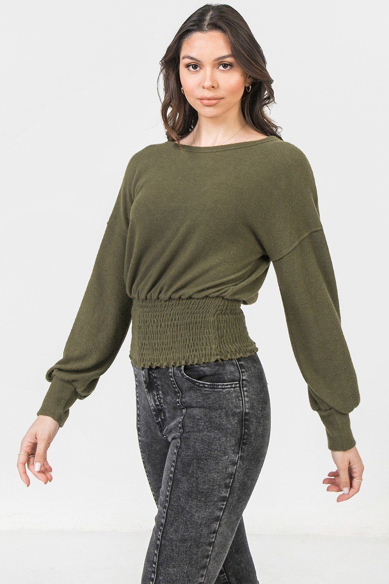 A Knit Top Featuring Wide Neckline